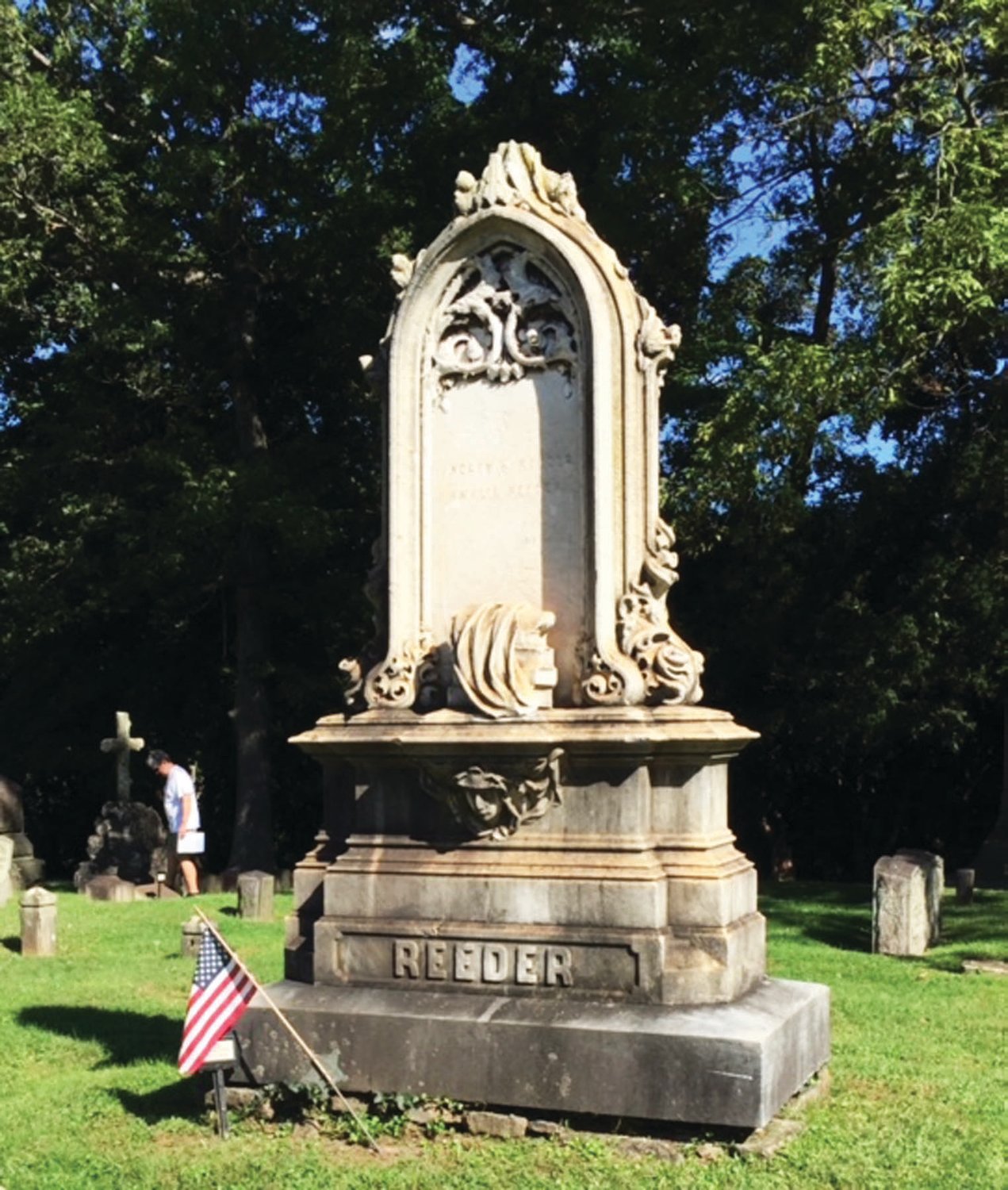 Andrew Reeder, former governor of the Kansas Territory, who later practiced law in Easton,  died in 1864.  His tombstone features books and mourning drapery indicating learning and sorrow. Photograph by Kathryn Finegan Clark