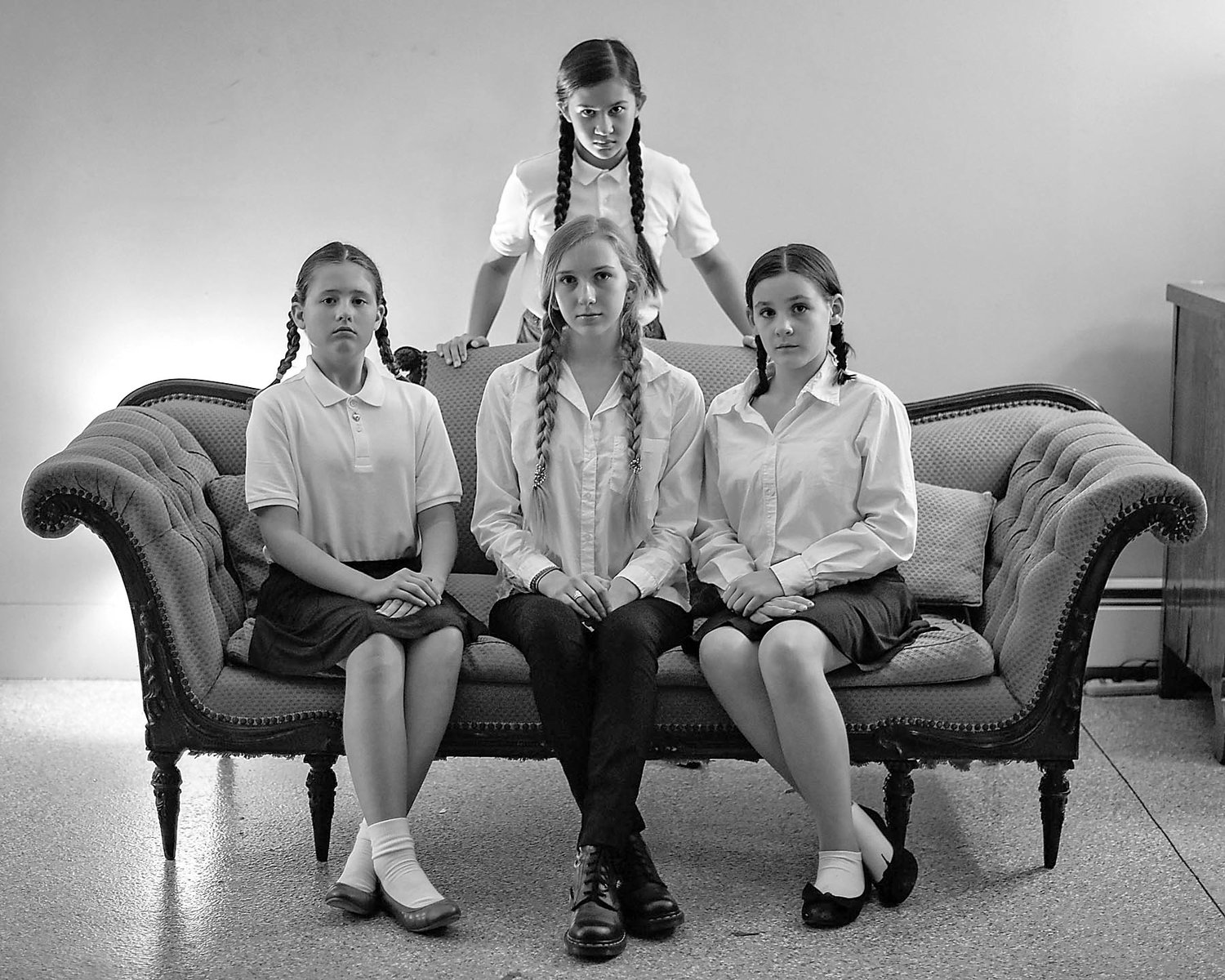 Seated from left are Julia Levy as Rosalie Wells, Devyn Costello-Henderson as Peggy Rogers, Caroline Gutsch as Evelyn Munn and standing behind Makayla McClintic as Mary Tilford. Photograph by Jessica Briggs Photography