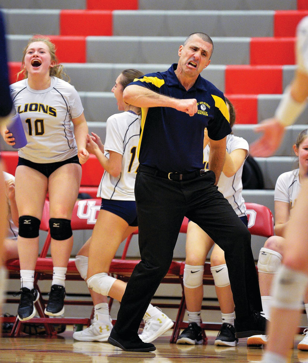 Lions coach Roy Watson is fired up on the court. Photograph by Michael A. Apice