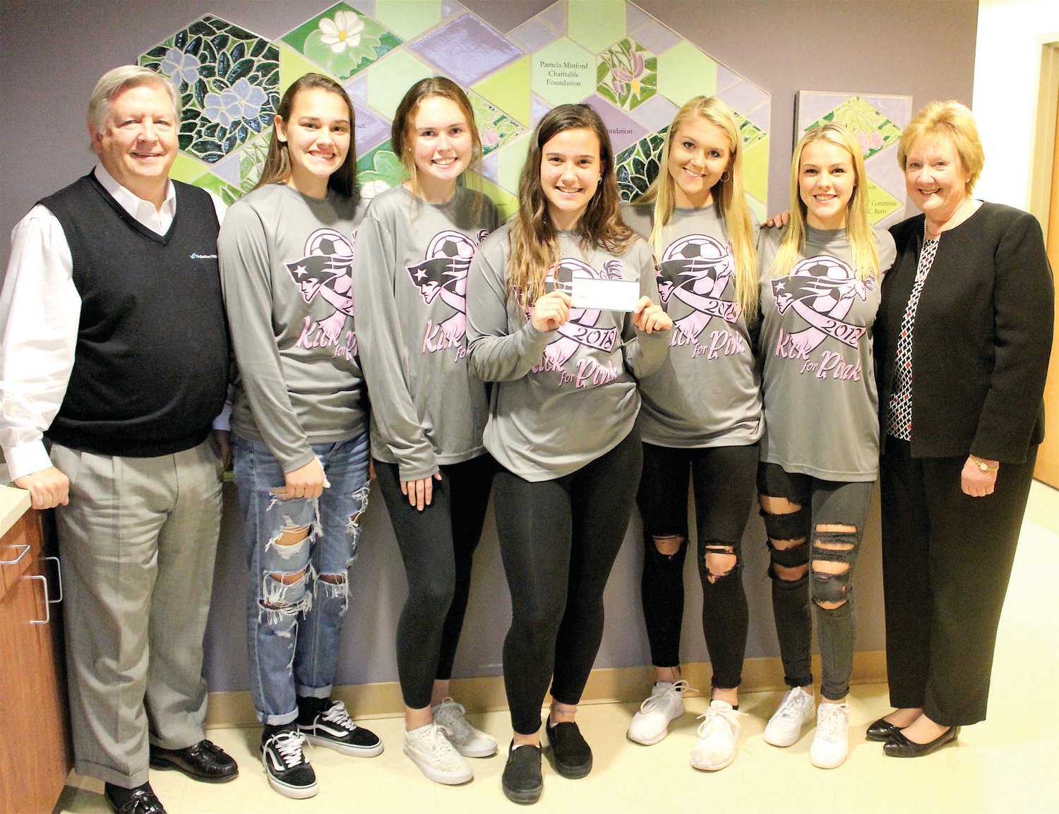From left are: Jim Brexler, president and CEO, Doylestown Health; students Jenna Abaza, Meghan Gallagher, Trish Hauck, Kristen Obetz, Anna Bound and Cathy Benner, executive director of Rehab and Cancer Services. Not pictured are Ashley Balderson and Julie Beedle.