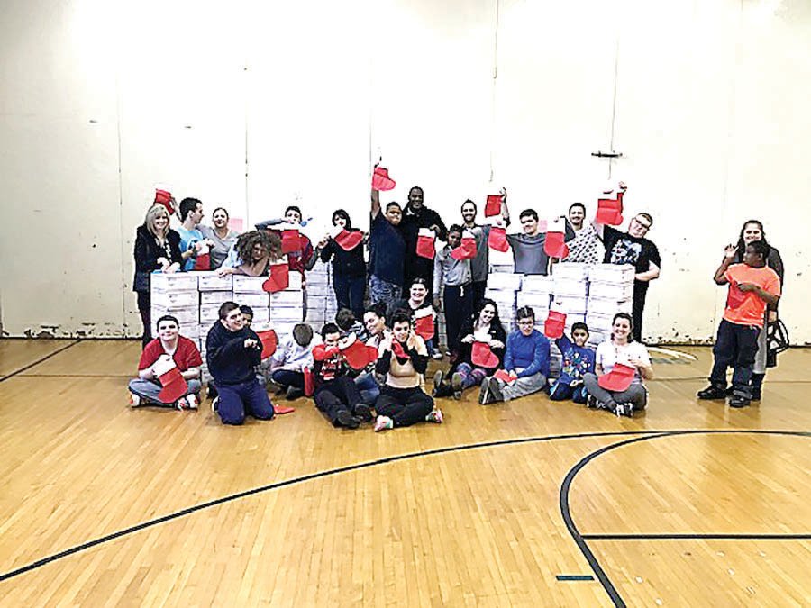 The students of Bucks County Intermediate Unit at Samuel Everitt filled 764 stockings with goodies for troops this holiday season.