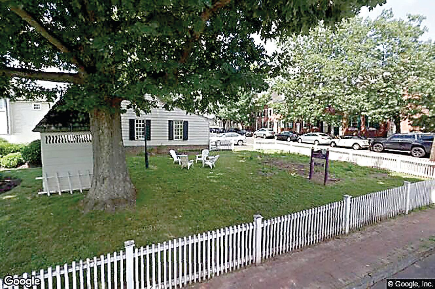 The side yard os one of the oldest Bucks County buildings is eyed for building by its owners.  Photograph by Steve Sherman