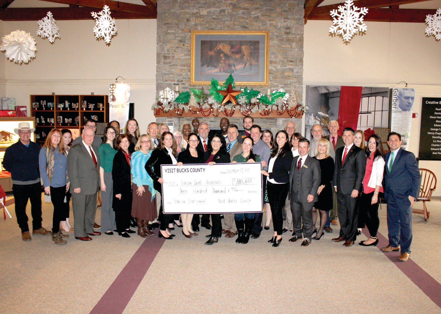 Representatives from organizations that received a total of $300,000 in grants from Visit Bucks County, along with officials, at the grant presentation.