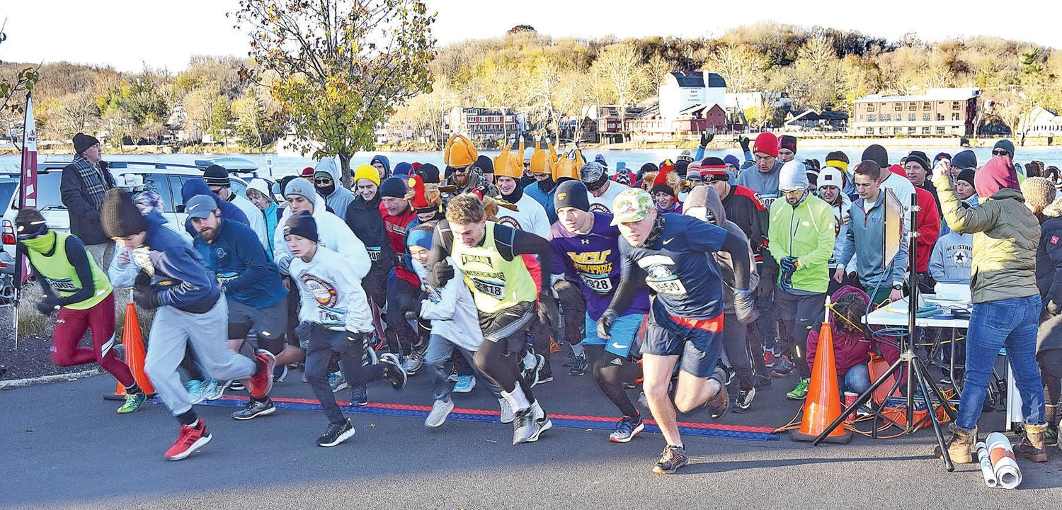 One thousand racers take off from the starting line. Photograph by Gordon Nieburg.