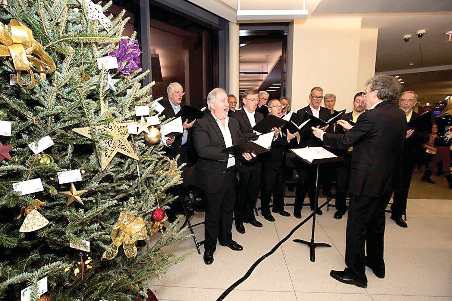 Cordus Mundi, a male a cappella chorus, sings during the ceremony. Photograph by Aimee Herd