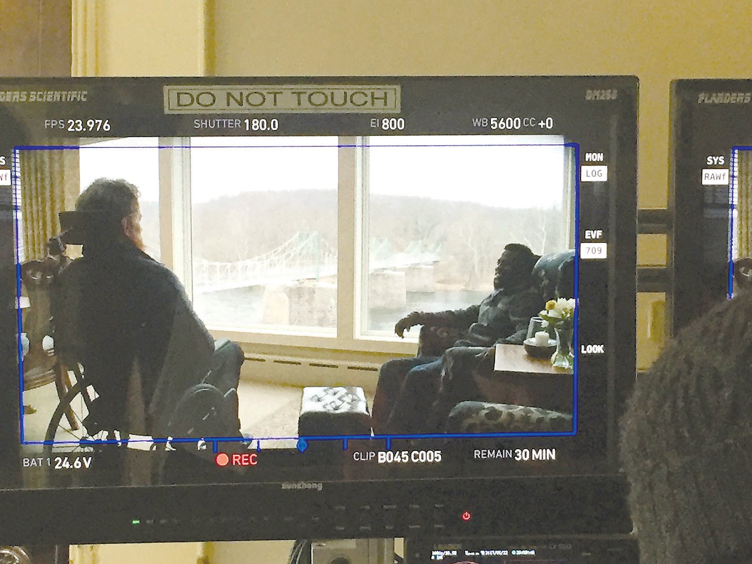 Stars Bryan Cranston and Kevin Hart look out over the Delaware River in this scene from the new movie “The Upside” shot at the Black Bass Hotel in Lumberville. Photograph by Laura Thompson Barnes