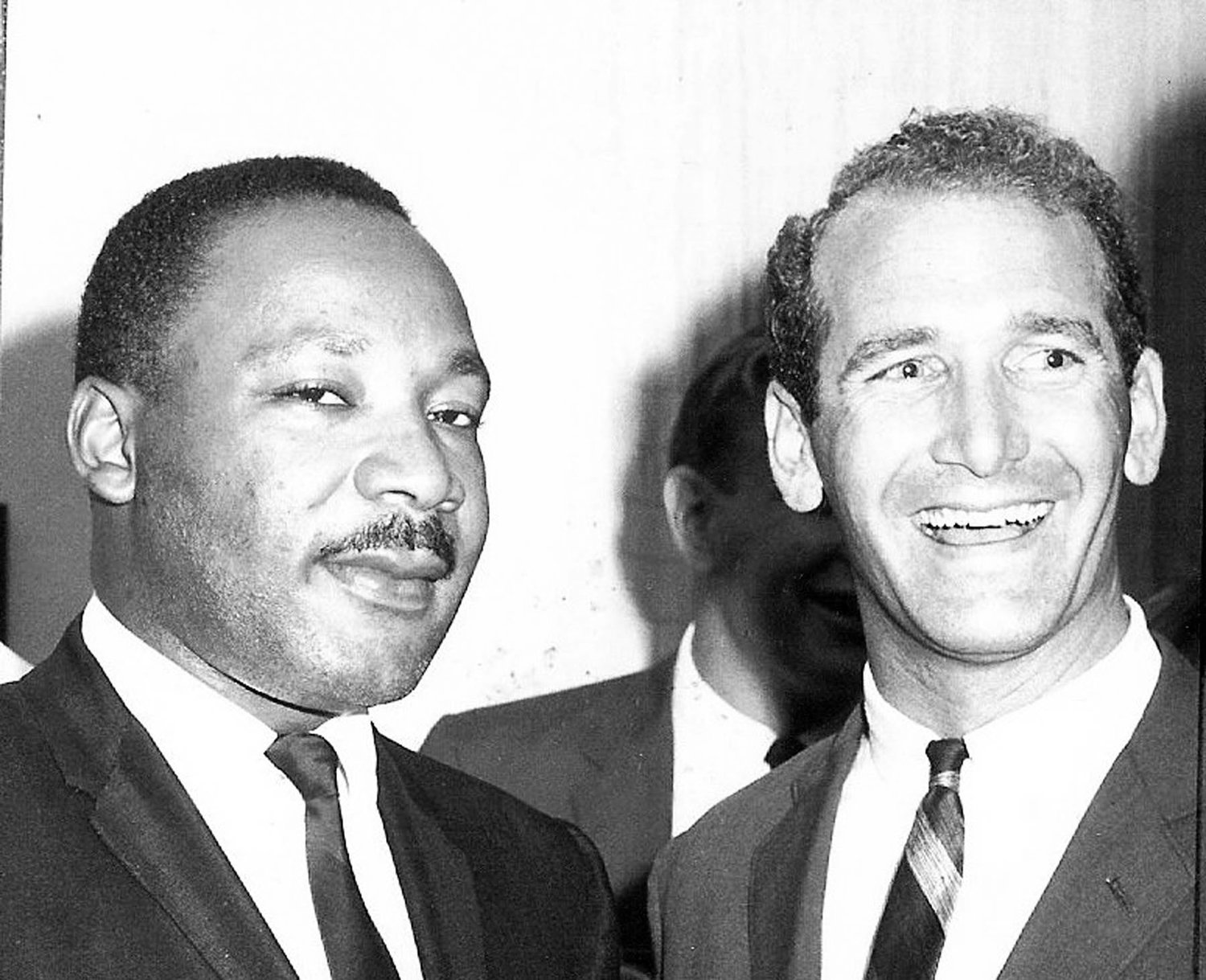 The Rev. Martin Luther King Jr., left, with Newtown Quaker Meeting member Norval Reece in 1967 in Philadelphia at a strategic planning session for an anti-poverty campaign.