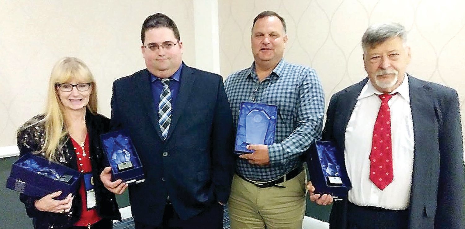 The EMS Council of New Jersey honored volunteer EMTs, from left, Laurie Luster, Brian Turner, Wilfrid W. Wong and Kenneth Weinberg with the 2018 Outstanding Rescue/Call of the Year Award for their efforts in trying to save a profusely bleeding patient.