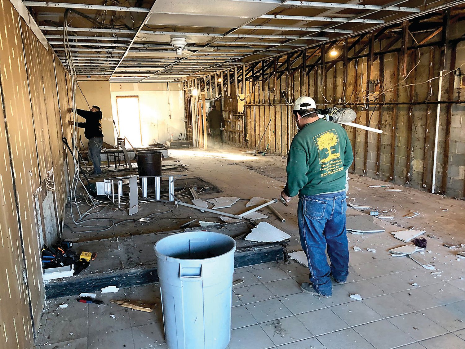Workers have gutted the space that held a laundromat to make way for storage space for the Delaware Valley Food Pantry.