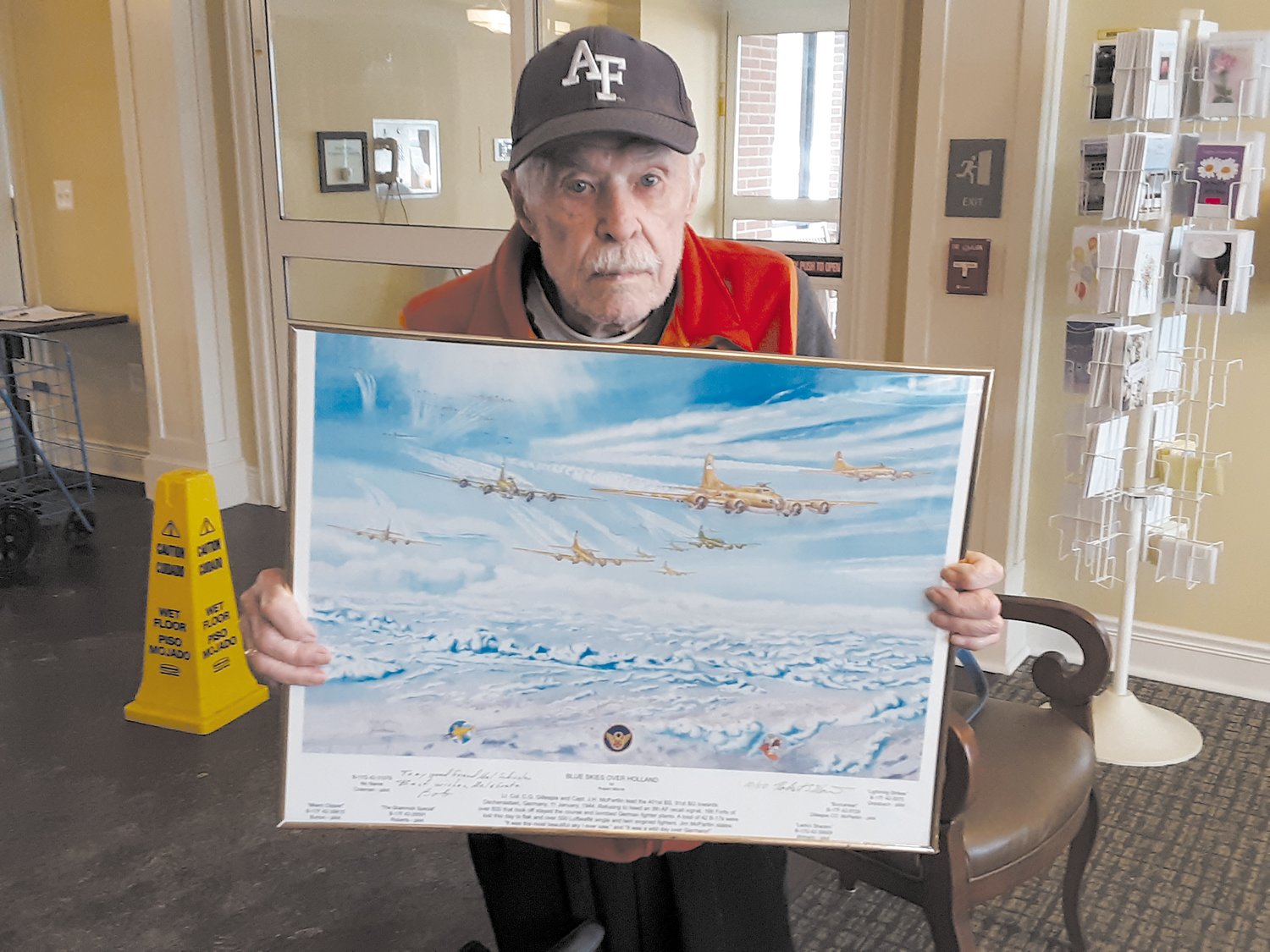 One of World War II veteran Melvin Schissler’s treasured possessions is “Blue Skies over Holland,” a rendering of a 1944 bombing mission to Oschersleben, Germany. It was a gift from Michigan artist Robert Morris.