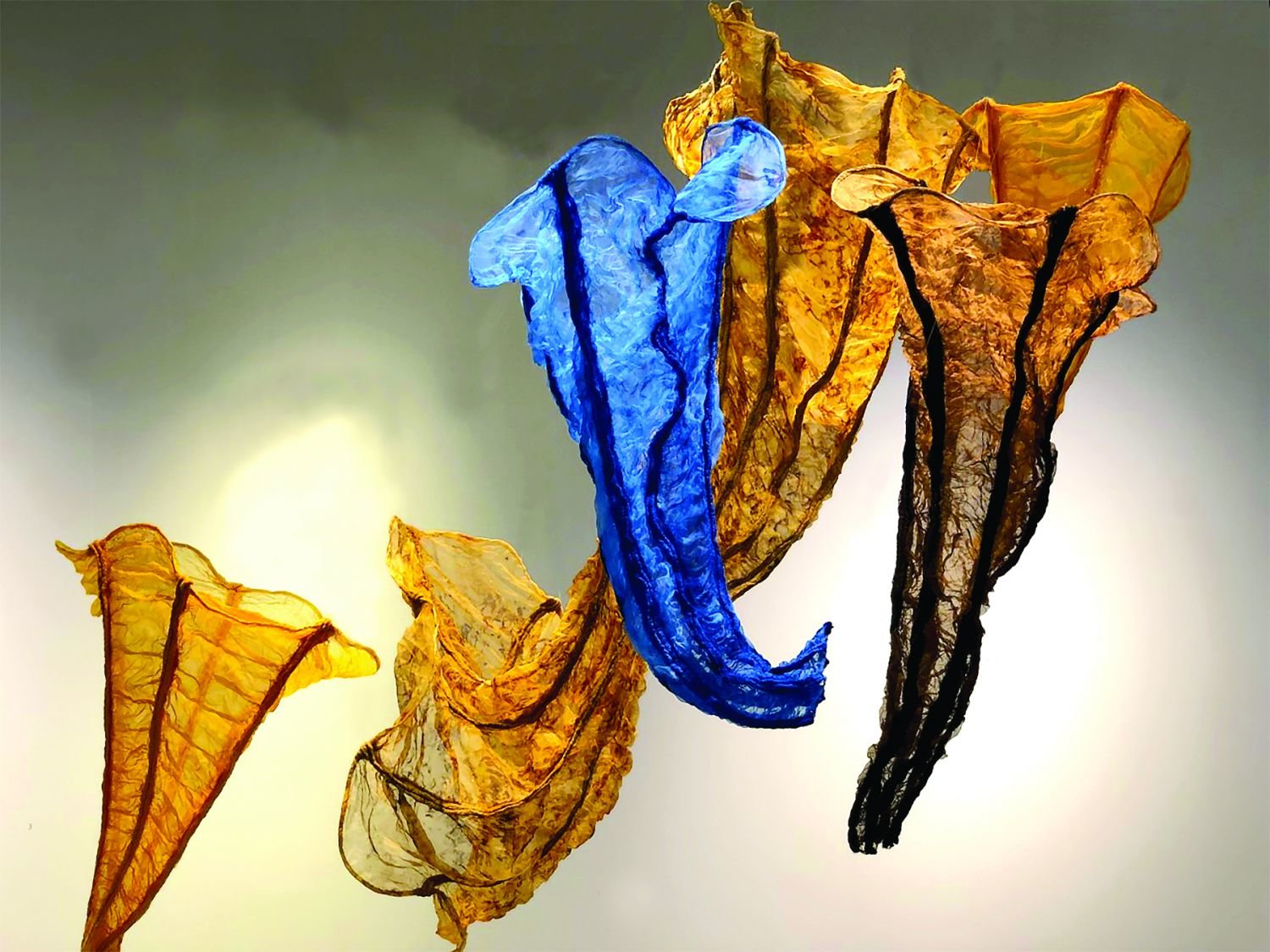 “Affluent” by Linda Celestian is a silk and wool fiber sculpture.