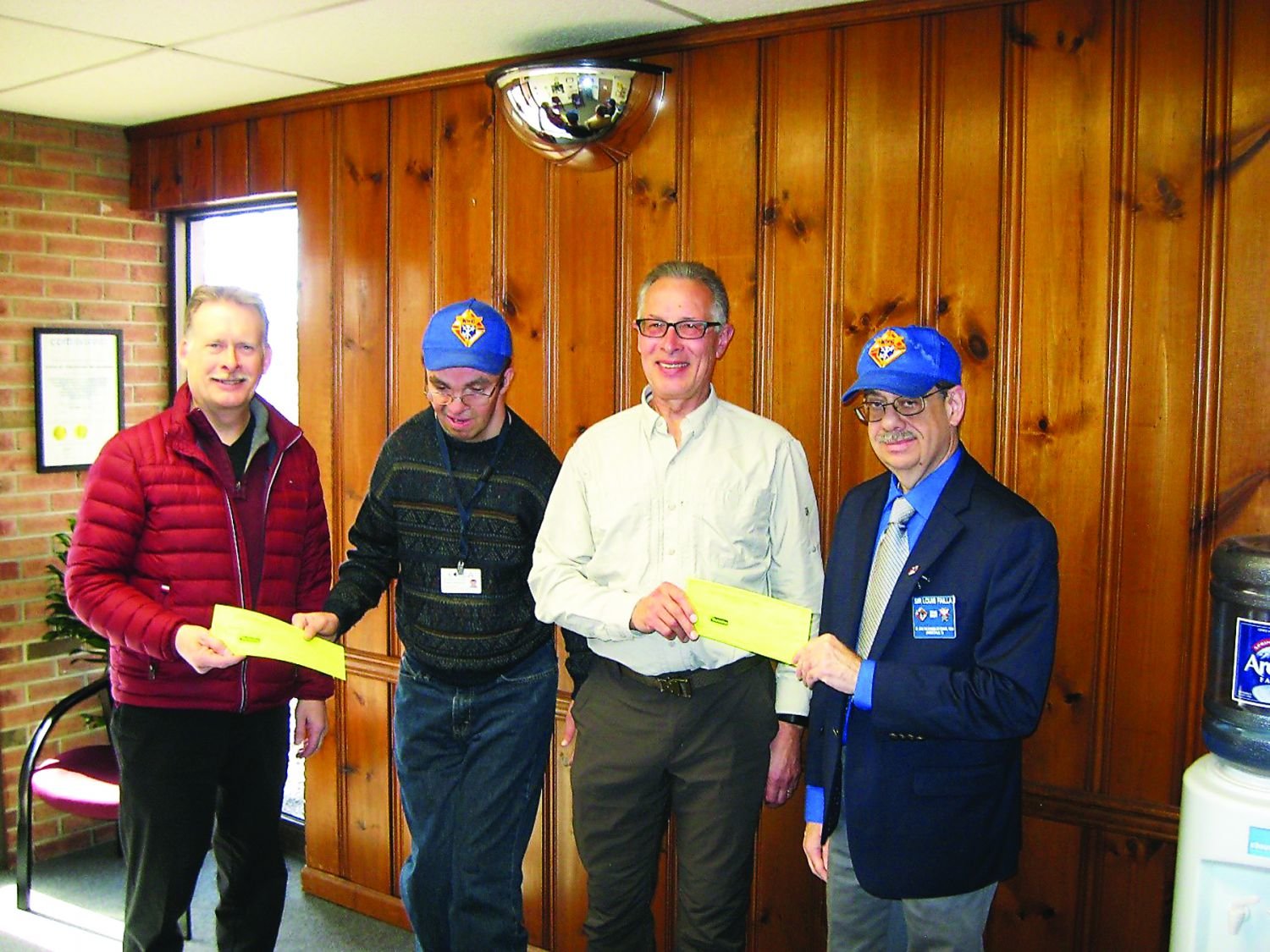 Participating in the Knights of Columbus check presentation are, from left, Jeff Mattison, executive director, The Arc of Hunterdon County; John Paul Gontarski, Knights of Columbus member as well as CEA Extended Employee and Arc participant; Michael Skoczek, CEA’s president and CEO; and Lou Failla, Knights of Columbus Grand Knight, Lambertville, N.J., chapter.
