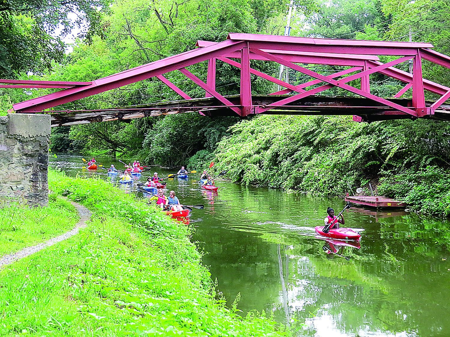 Kayaking under Woody’s Camelback Bridge on the historic Delaware Canal.