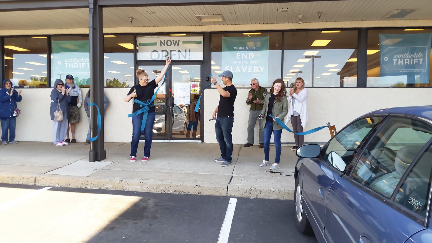 Dan Emr, Worthwhile Wear’s executive director, shared a few words of thanks before cutting the ribbon with fellow staff members at the new store in Plumsteadville.