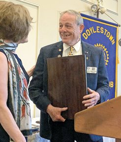Max Rose, 2019 Rotarian of the Year, receives his award from club President Gail Linenberg.