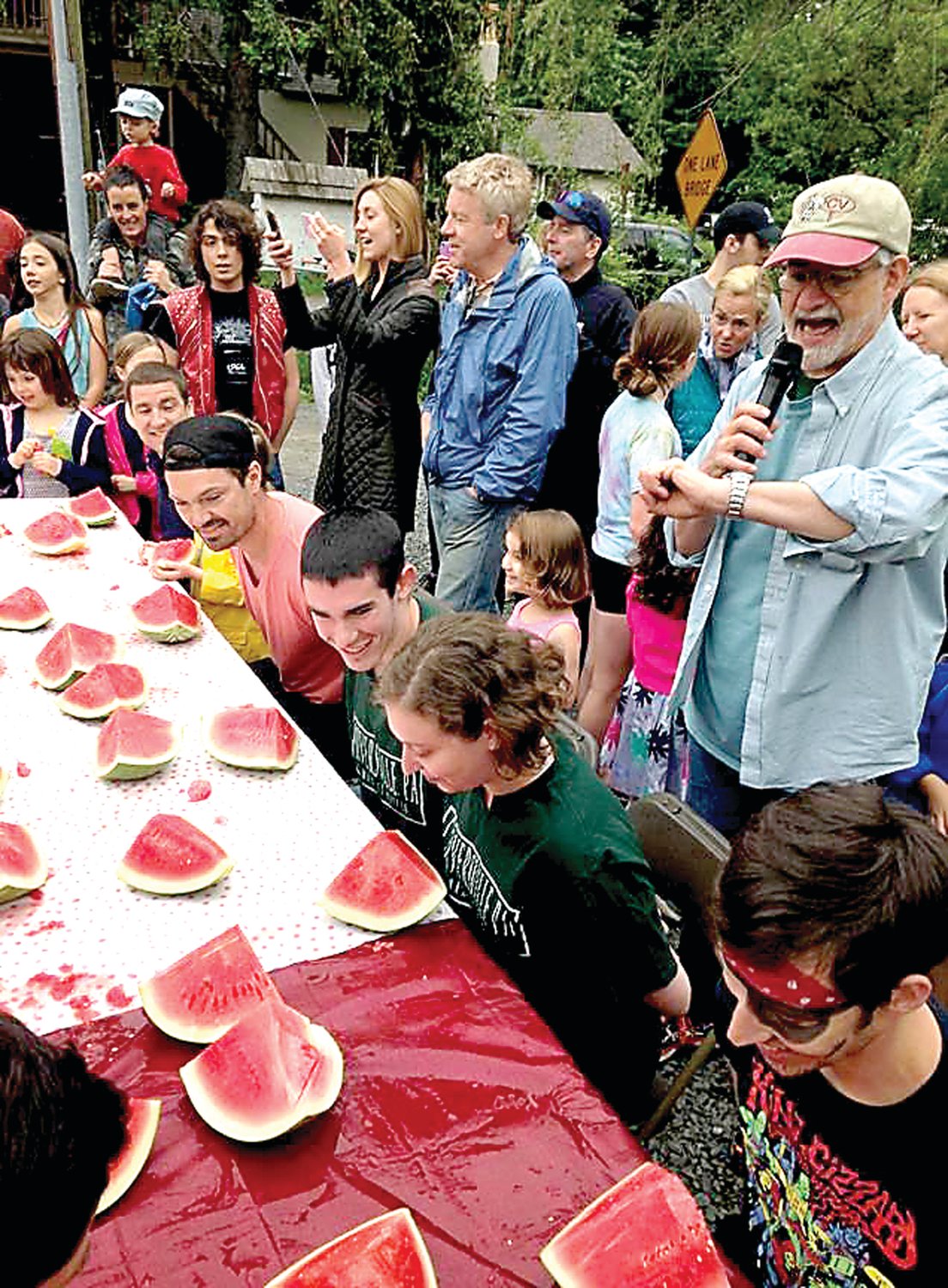 Contestants in a Carversville Day watermelon-eating contest get ready to dig in. The next Carversville Day, offering a watermelon-eating contest and much more, is set for May 18.