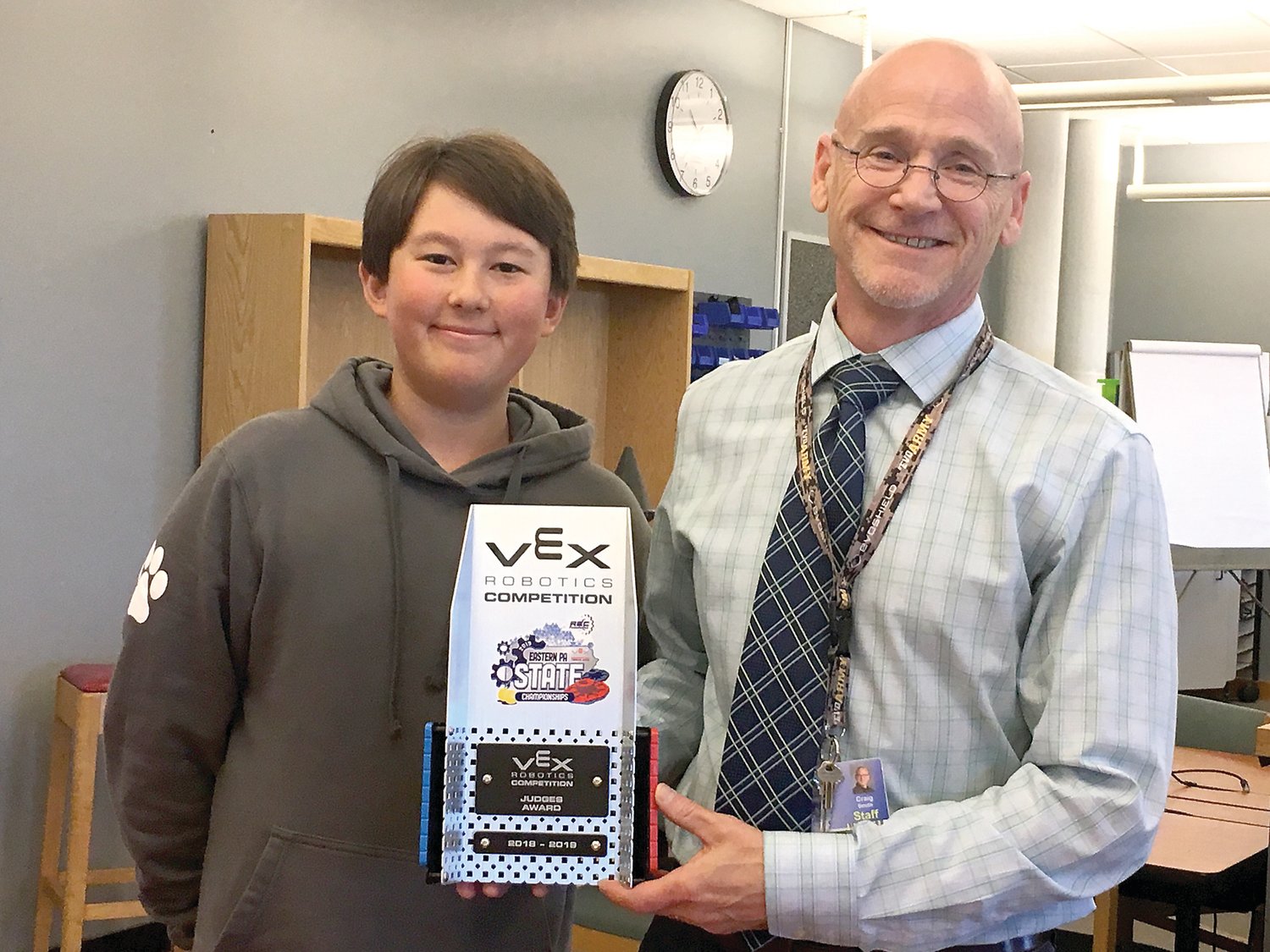 Sam Hoffman, left, with Craig Smith, New Hope-Solebury Middle School librarian and robotics club advisor.