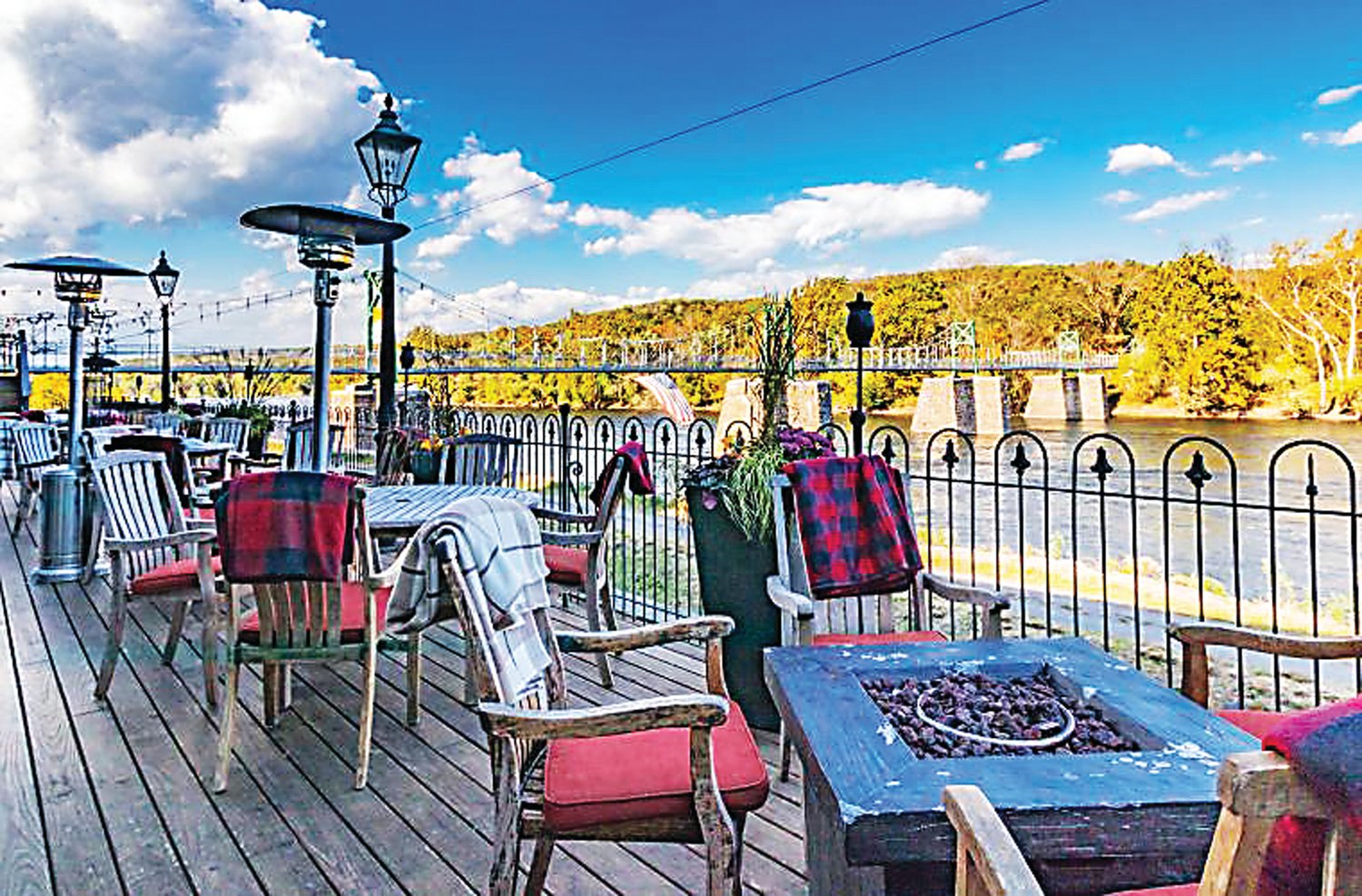Diners at the Black Bass Hotel in Lumberville have an expansive view of the Delaware River.