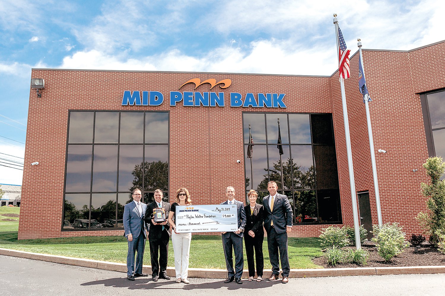 From left are: Justin Webb, chief operating officer, Mid Penn Bank; Michael Peduzzi, chief financial officer, Mid Penn Bank; Julie Walker, founder and executive director, The Peyton Walker Foundation; Rory Ritrievi, president and CEO, Mid Penn Bank; Joan Dickinson, chief of staff, Mid Penn Bank; and Scott Micklewright, chief revenue officer, Mid Penn Bank.