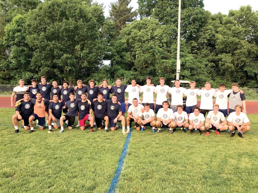 Members of the New Hope-Solebury boys soccer team, above, participated in the Robert Nagg Memorial Game and Fundraiser.