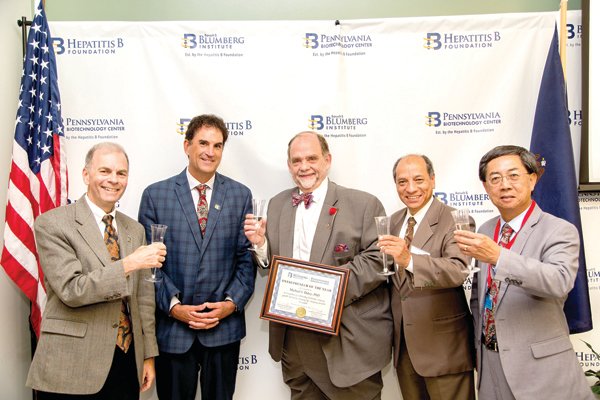 Toasting Entrepreneur of the Year Michael Daley, founder and CEO, OrthogenRx center, are from left, Timothy Block, president, and Louis Kassa, executive vice president and COO, both of the Pennsylvania Biotechnology Center; and David Toledo, chief product development officer, OrthogenRx; and Patrick Lam, chair of the PA Biotech Center’s Entrepreneur Council.