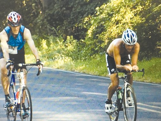 Pipersville resident Todd Wiley, right, competes in the 2015 Bucks County Duathlon.
