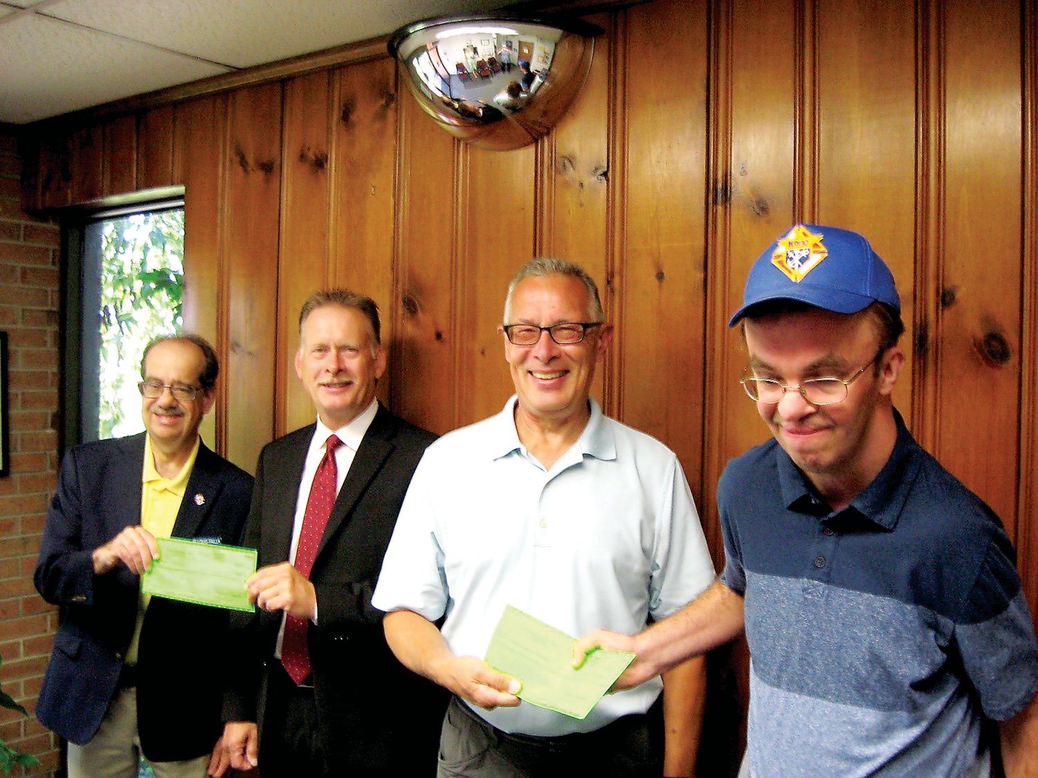 Participating in the check presentation are, from left, Lou Failla, Knights of Columbus Grand Knight (Lambertville Council); Jeff Mattison, executive director, The Arc of Hunterdon County; Michael Skoczek, CEA’s president and CEO; and John Paul Gontarski, Knights of Columbus member as well as CEA Extended Employee and ARC participant.
