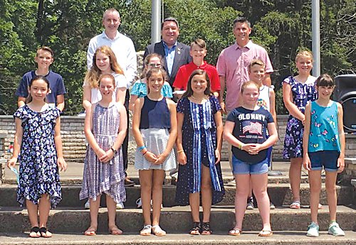 U.S. Rep. Brian Fitzpatrick, state Rep. Craig Staats and Bucks County Commissioner Rob Lougherty gather with some of the essay contest winners who were able to attend the opening ceremony for Pennridge Community Day.