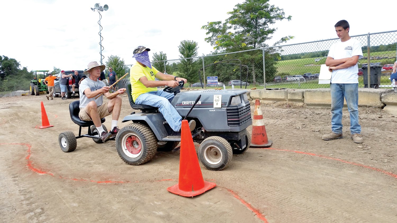 The Blindfolded Garden Tractor Driving Contest at the Hunterdon County 4-H and Ag Fair  is open for the public to enter.  Photograph by Terry Wright.
