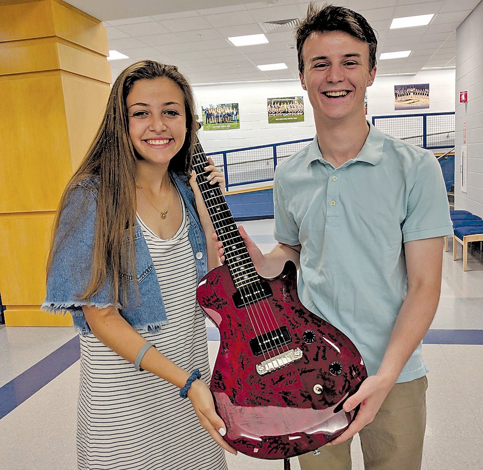 After receiving awards from the Jonathan D. Krist Foundation, 2019 New Hope-Solebury graduates Zoe Palau and Ben Dupont added their signatures beside 51 others on what’s known as the Jonny Signature Guitar.
