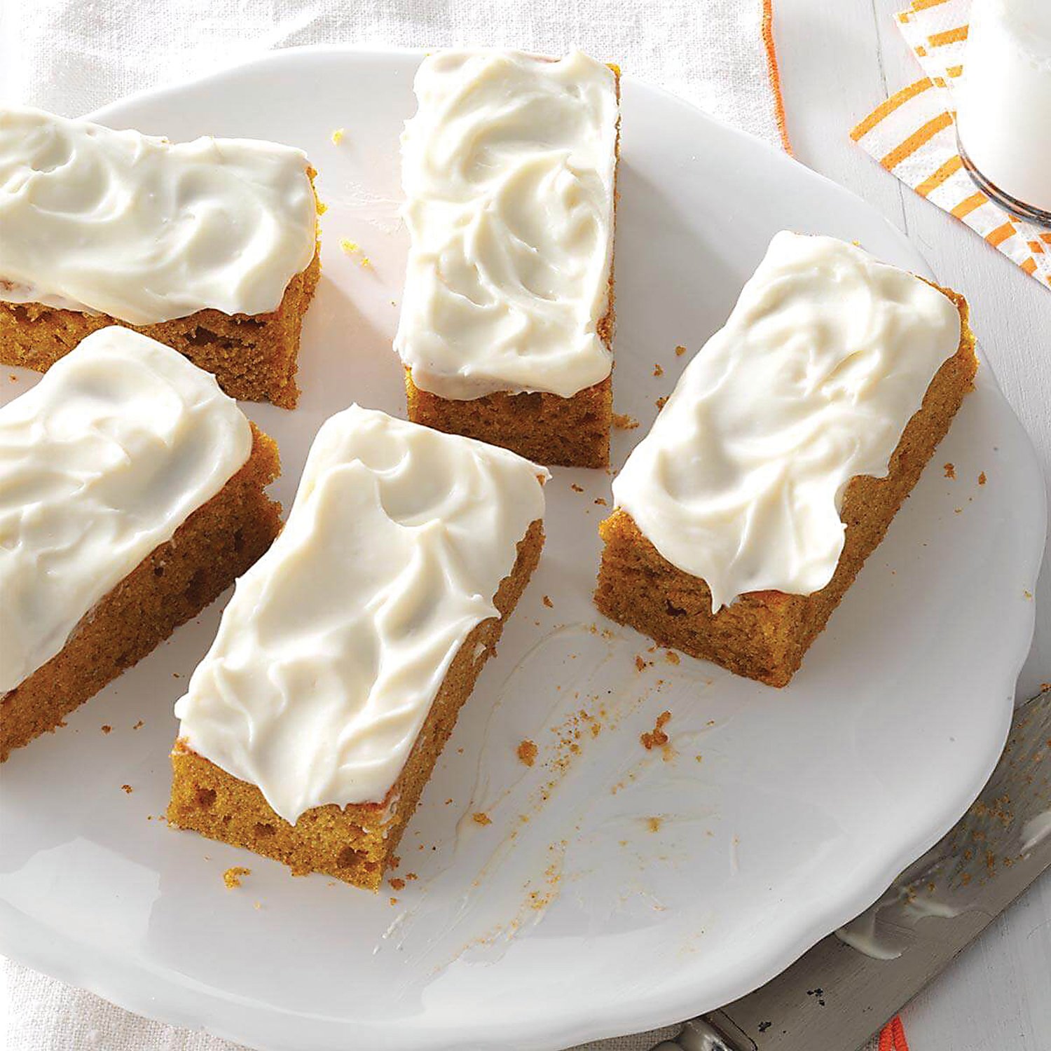 Pumpkin Bars have all the flavor of pumpkin pie, plus cream cheese frosting on top. Photograph by Tasteofhome.com