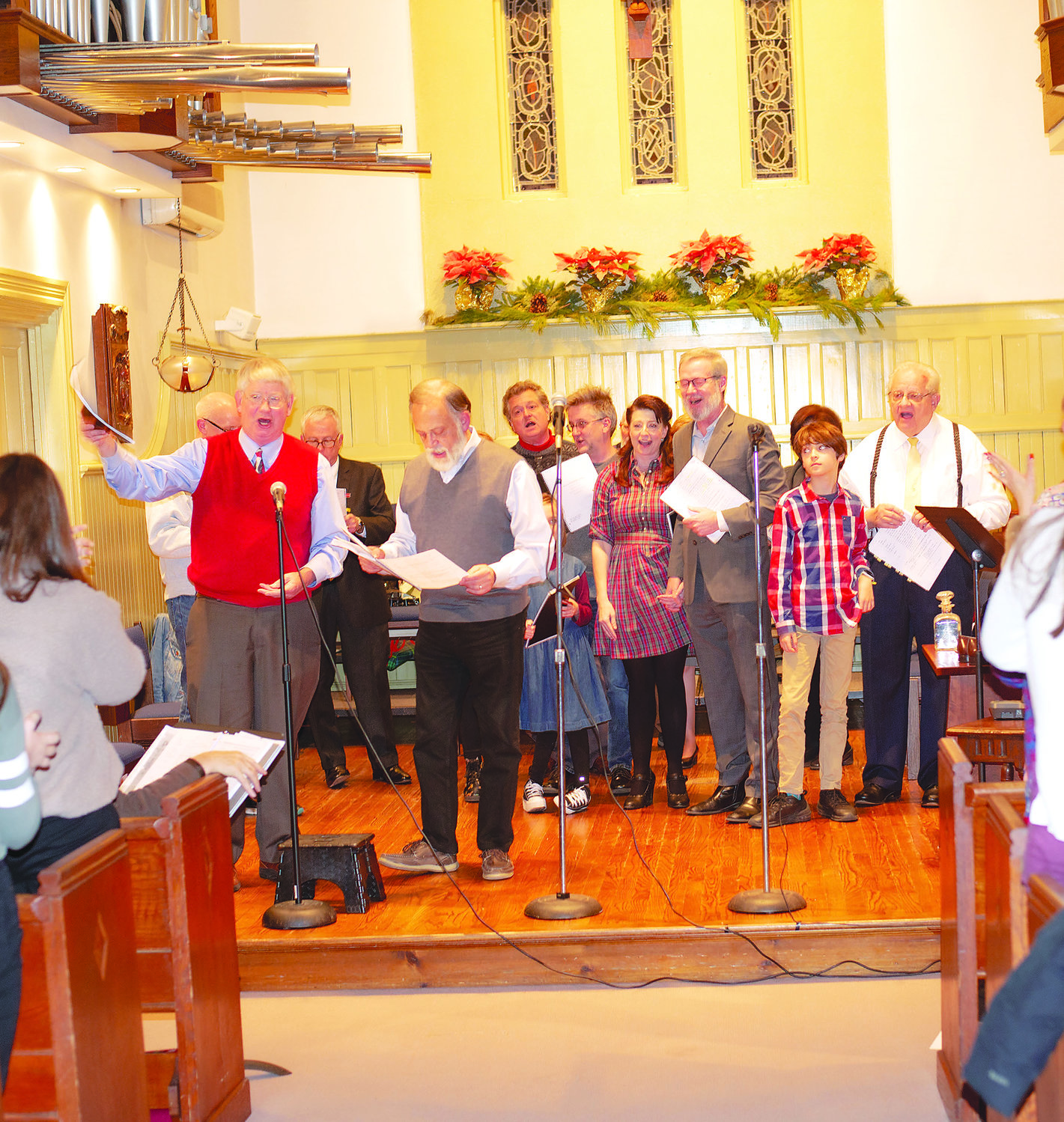 The cast of “It’s a Wonderful Life Radio Play” performs at St. Andrew’s Episcopal Church in Yardley during a fundraiser for a local food pantry.