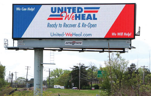 A billboard above I-95 South, just prior to the Street Road (Route 32) exit advertises an effort by area businesses to help one another make it through the COVID-19 pandemic.