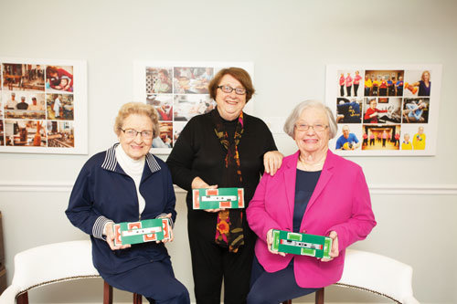 Jayne Reddie, left, Jane Ball and Shirley Wunsch pose with their bridge boards pre-coronavirus.