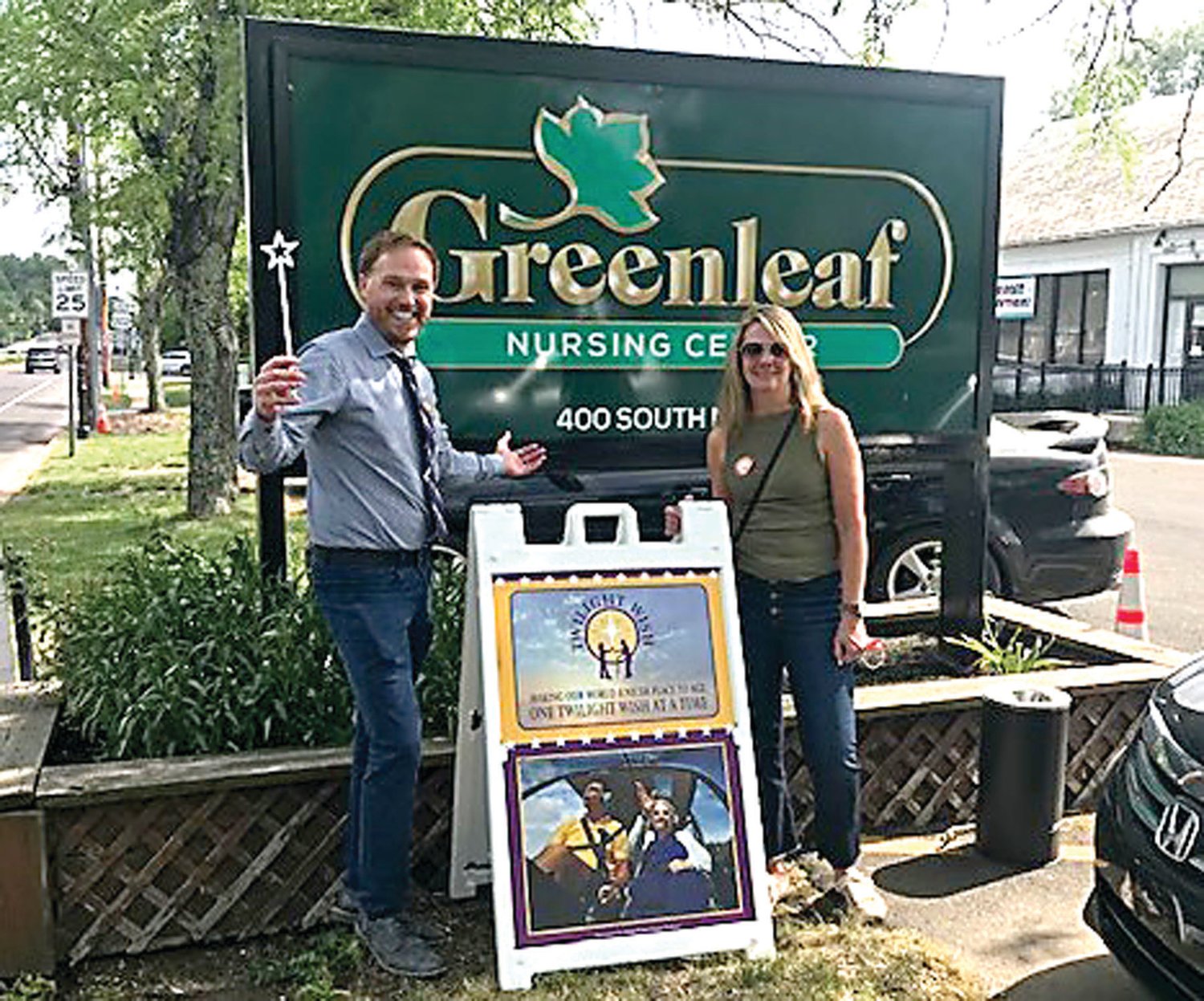 Twilight Wish Executive Director Brant Lingle and Director of Community Relations Mary Farrell outside Greenleaf Nursing.