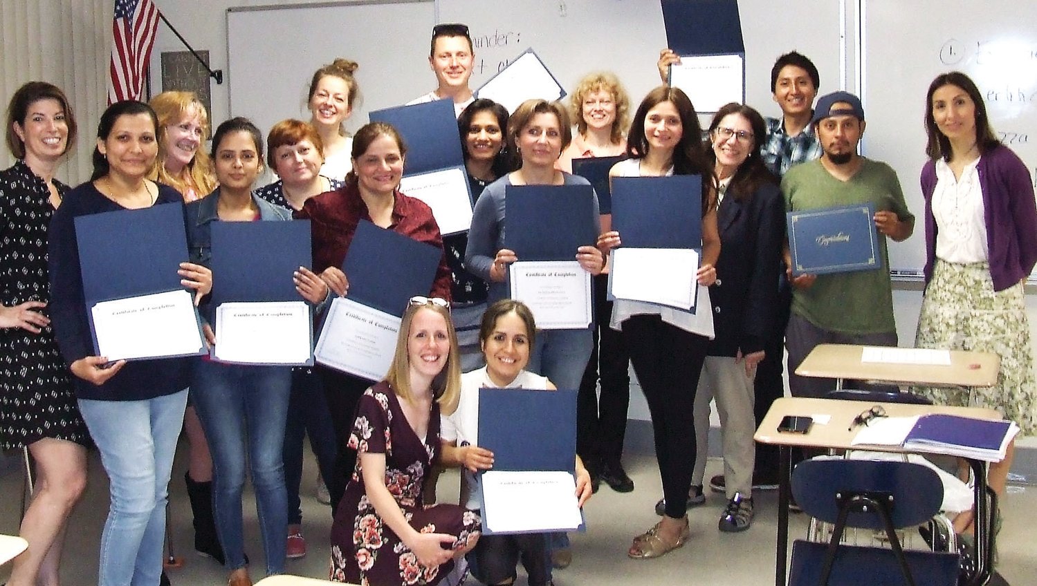 Vita staff, students, and program collaborators from Bucks County Community College celebrate students’ successful completion of Vita’s “Grow Your Own Business” integrated English literature and civics education class, which combines language learning and professional training to start or expand a business.