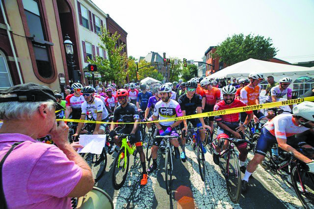 Bikers line up at the starting line, as organizers run down the list of participants. Bikes came from across the globe to be part of The Bucks County Classic bike race.