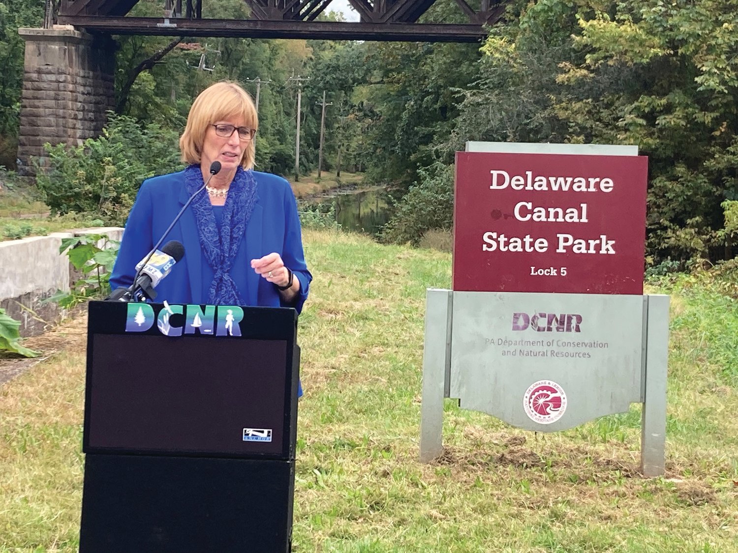 Pennsylvania Department of Conservation and Natural Resources Secretary Cindy Adams Dunn talks about the need for investing in state parks during an Oct. 12 news conference along the Delaware Canal in Yardley Borough.