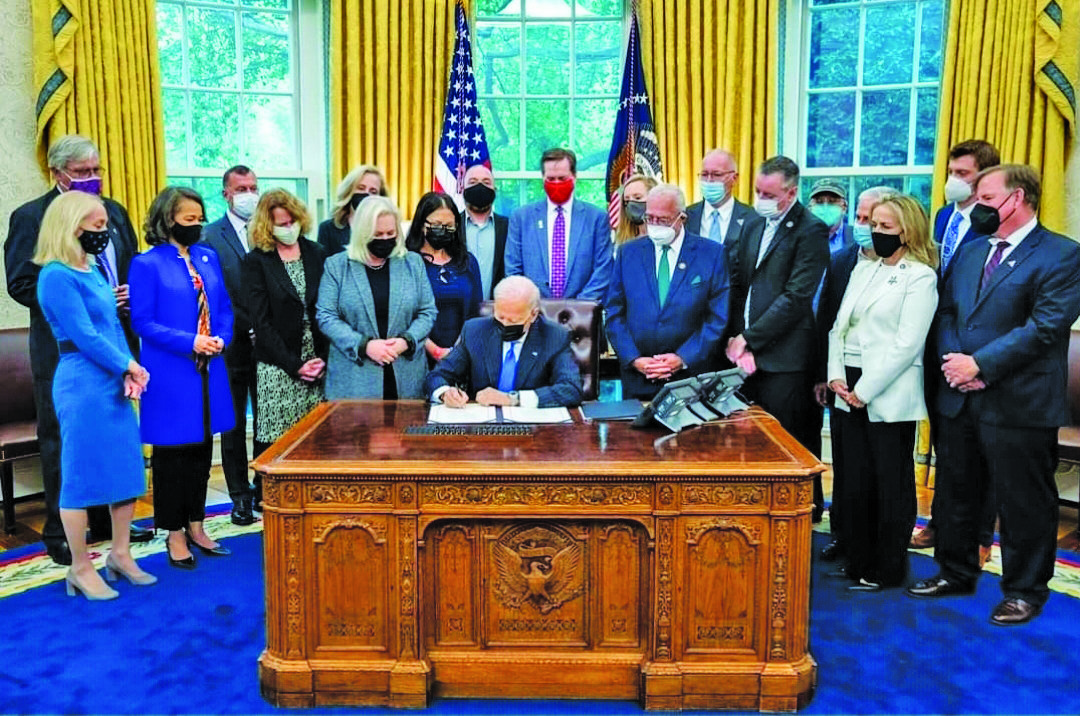 Supporters of legislation designating the September 11th National Trail surrounded President Biden as he signed the legislation authorizing the trail last week.