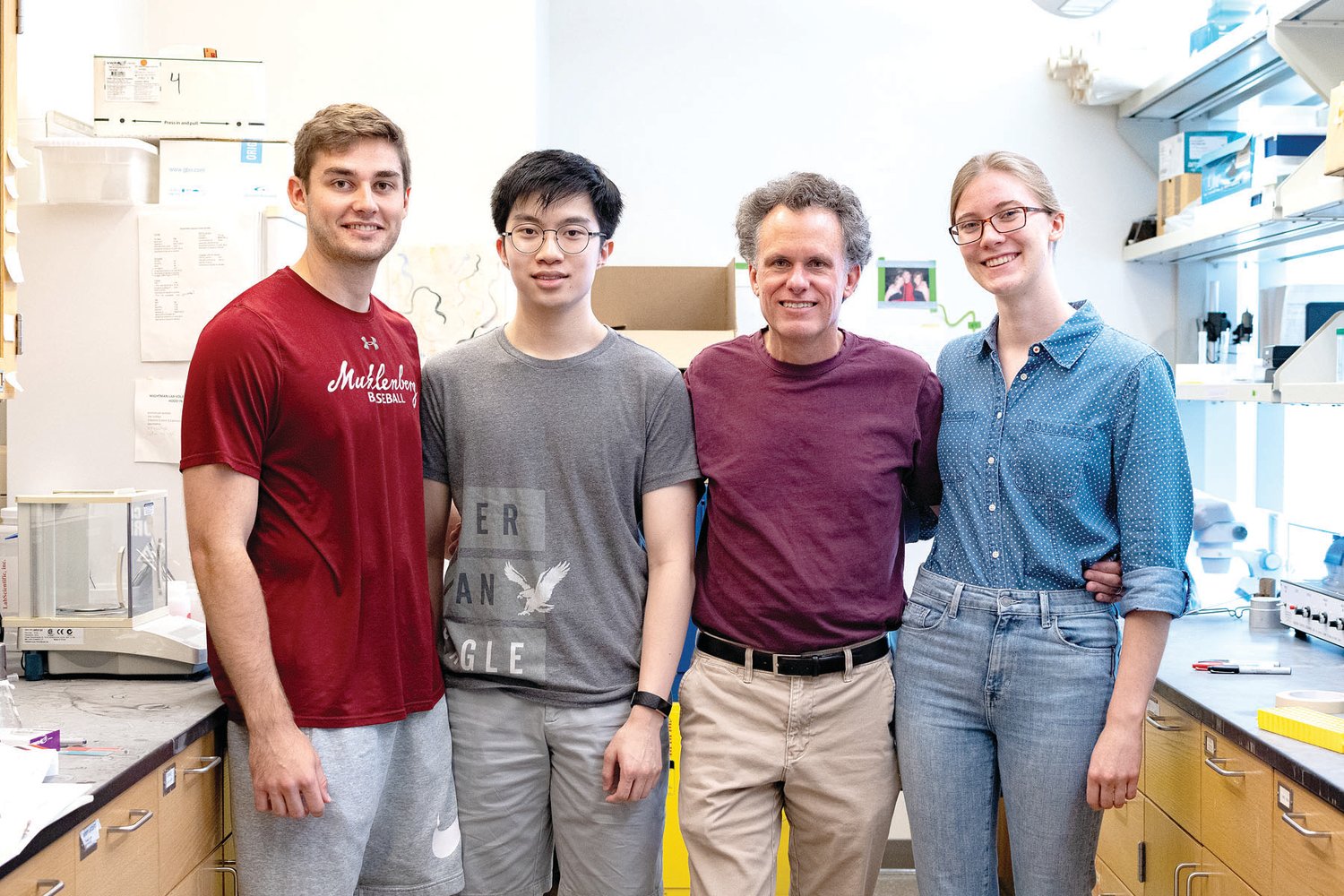 Danny Monzo, Long Nguyen, professor Bruce Wightman and Isabella van der Weide in the Wightman Lab.