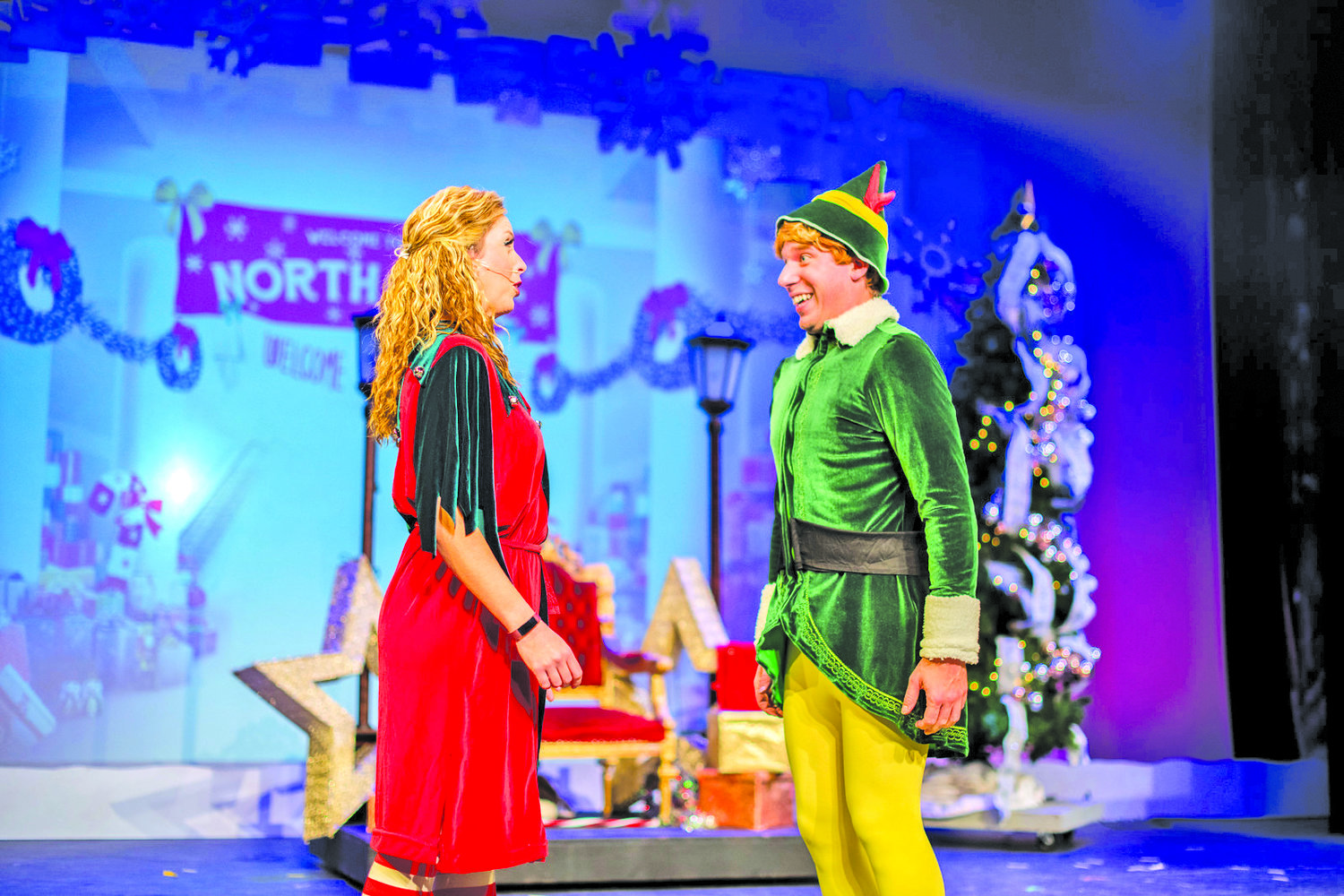 The characters of Buddy and Jovie, on stage, act in the Music Mountain Theatre production of “Elf.”