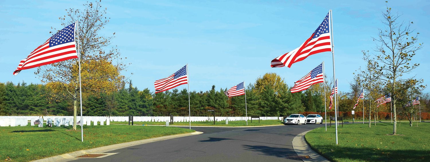 American flags cemetery grounds displaying American flags commemorating Veterans Day
