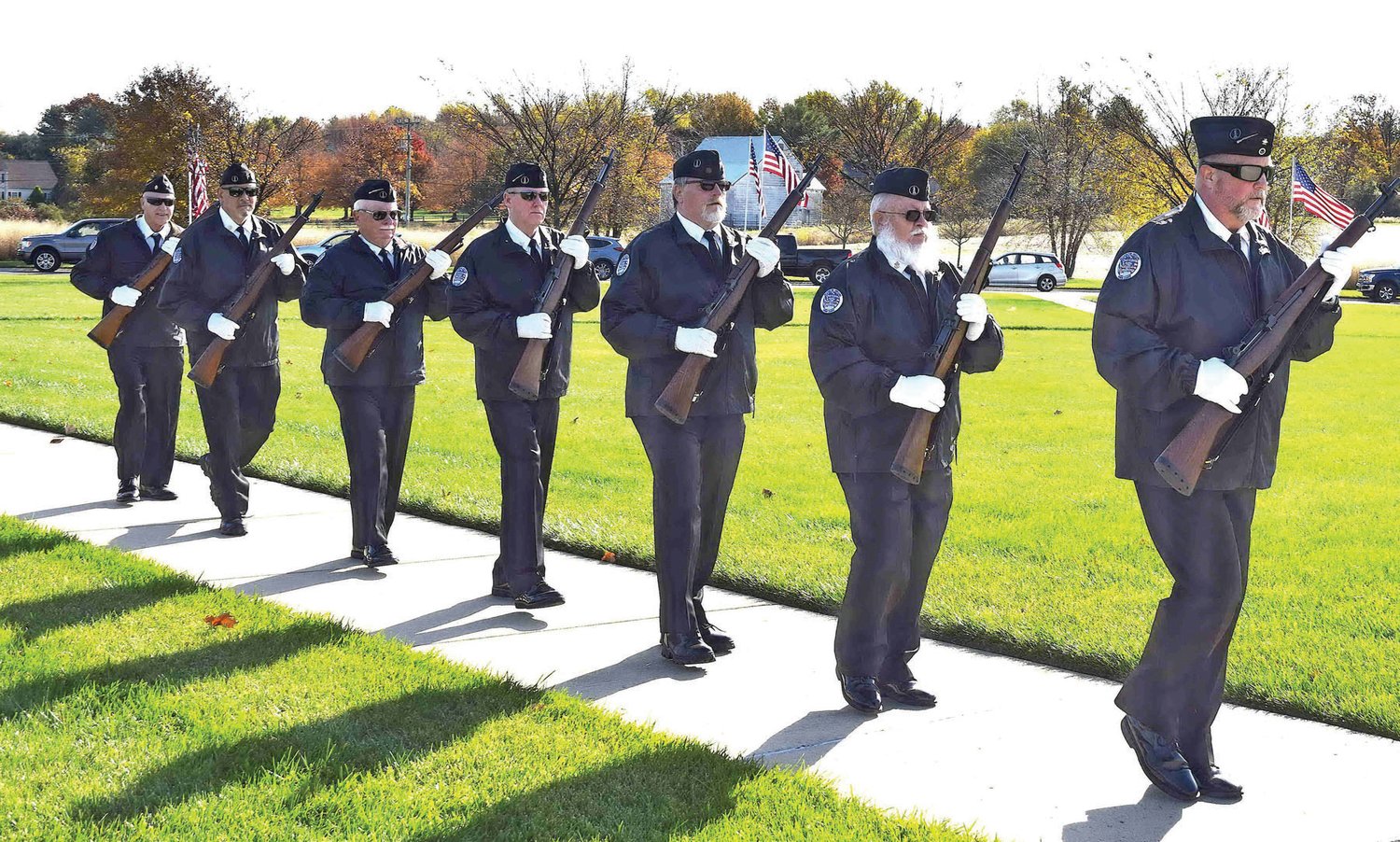 Members of the Washington Crossing Guardians of the National Cemetery Honor Guard march-in with formations and gun salute.