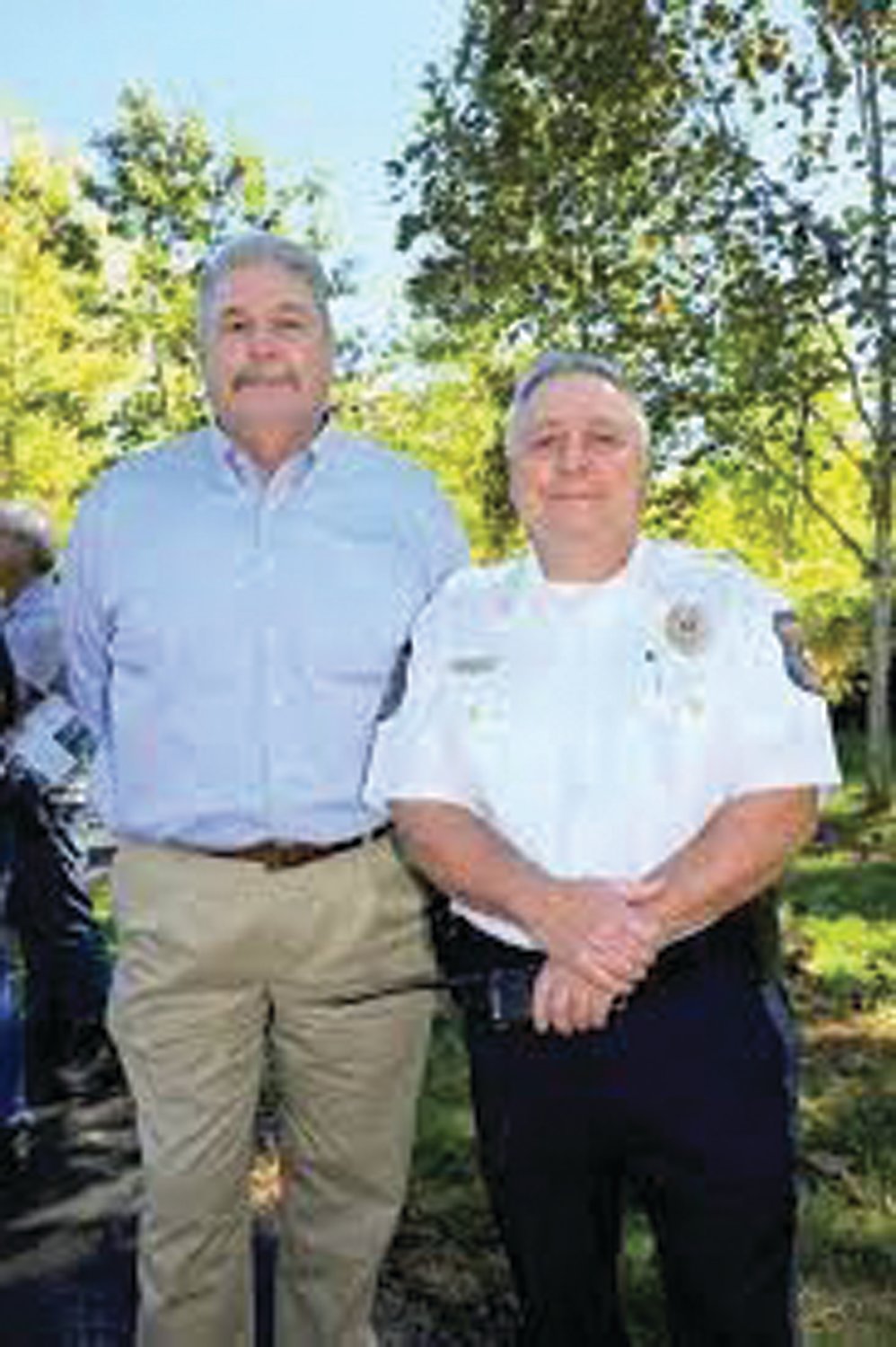 Solebury Township Manager Dennis H. Carney, left, stands with Solebury Police Chief Dominick Bellizzie at the opening of Aquetong Spring Park.