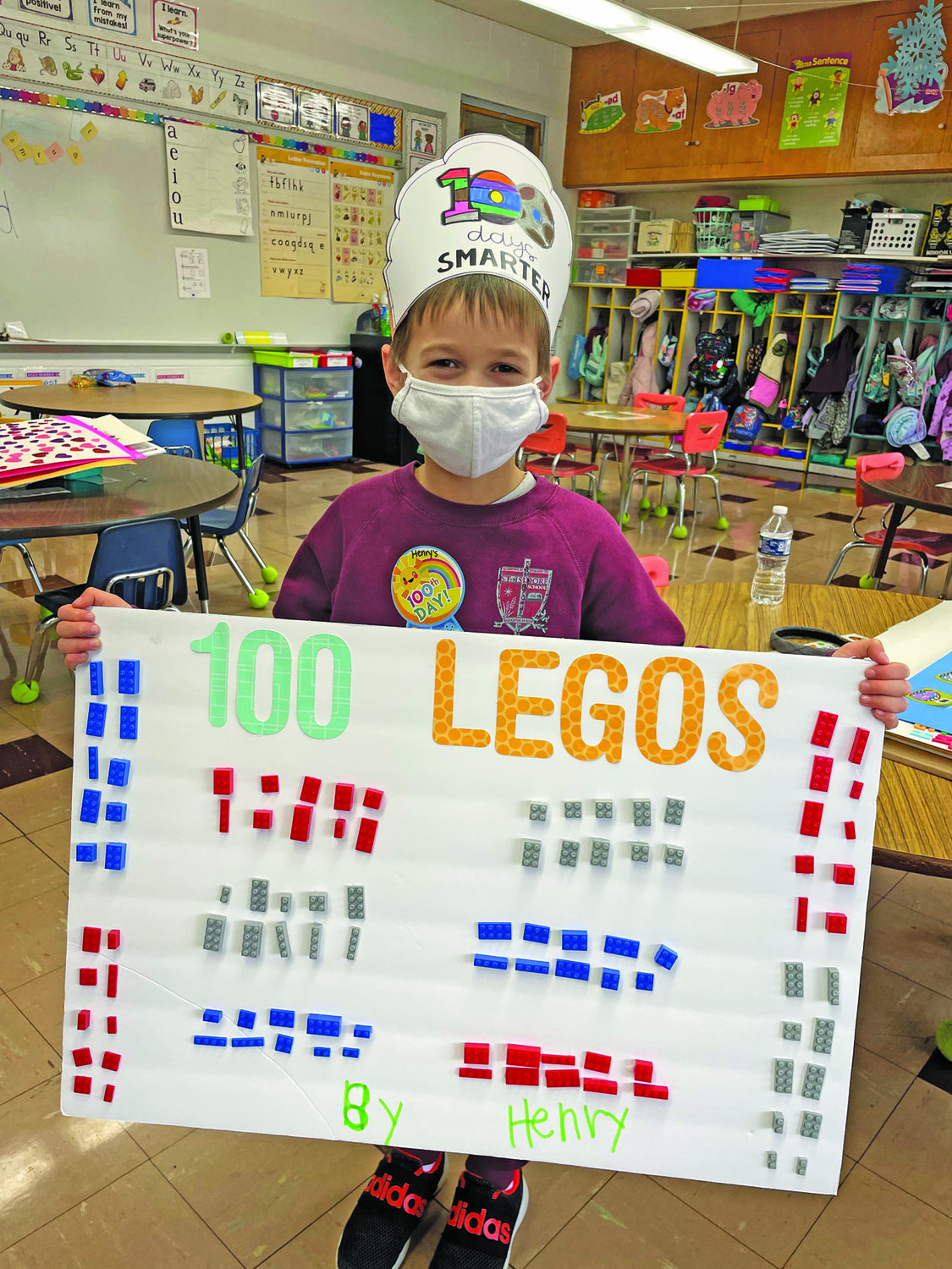 St. Isidore kindergarteners were asked to create a poster with 100 items.
