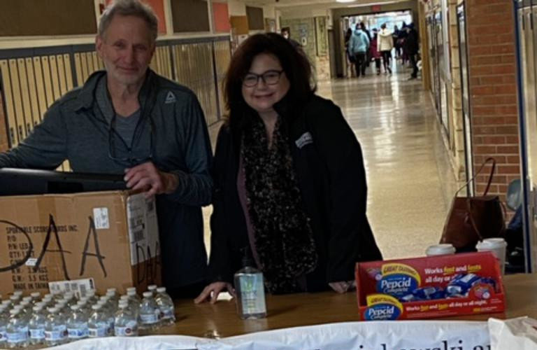 At last year’s DAA food drive are Art Bass and Realtor Cindy Marcinkowski, who is also a DAA volunteer.