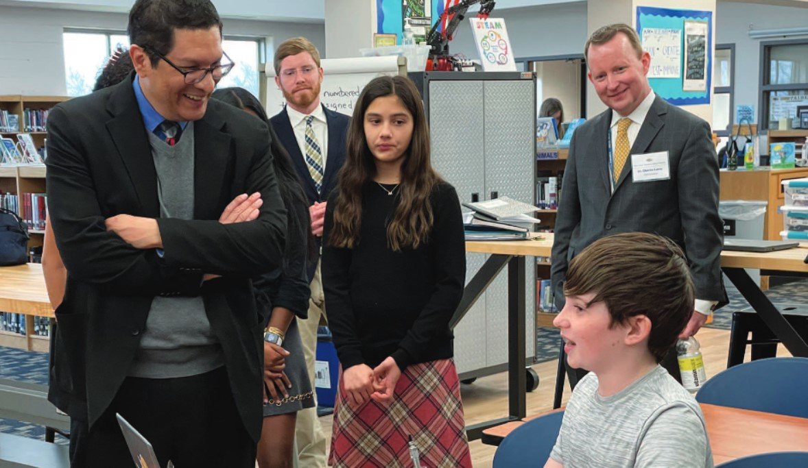 The Pa. secretary of education, left, met students in a middle school classroom. With the group are Dan Fagan from the office of Sen. Steve Santarsiero, student Maya Patel, Superintendent Dr. Charles Lentz, and student Logan Frapwell.