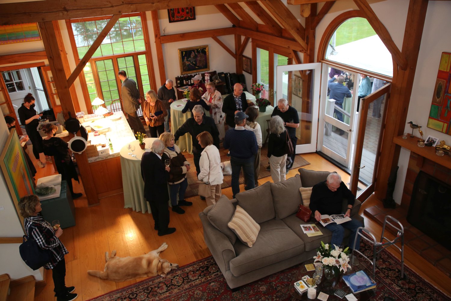 Guests gather in the main gallery.