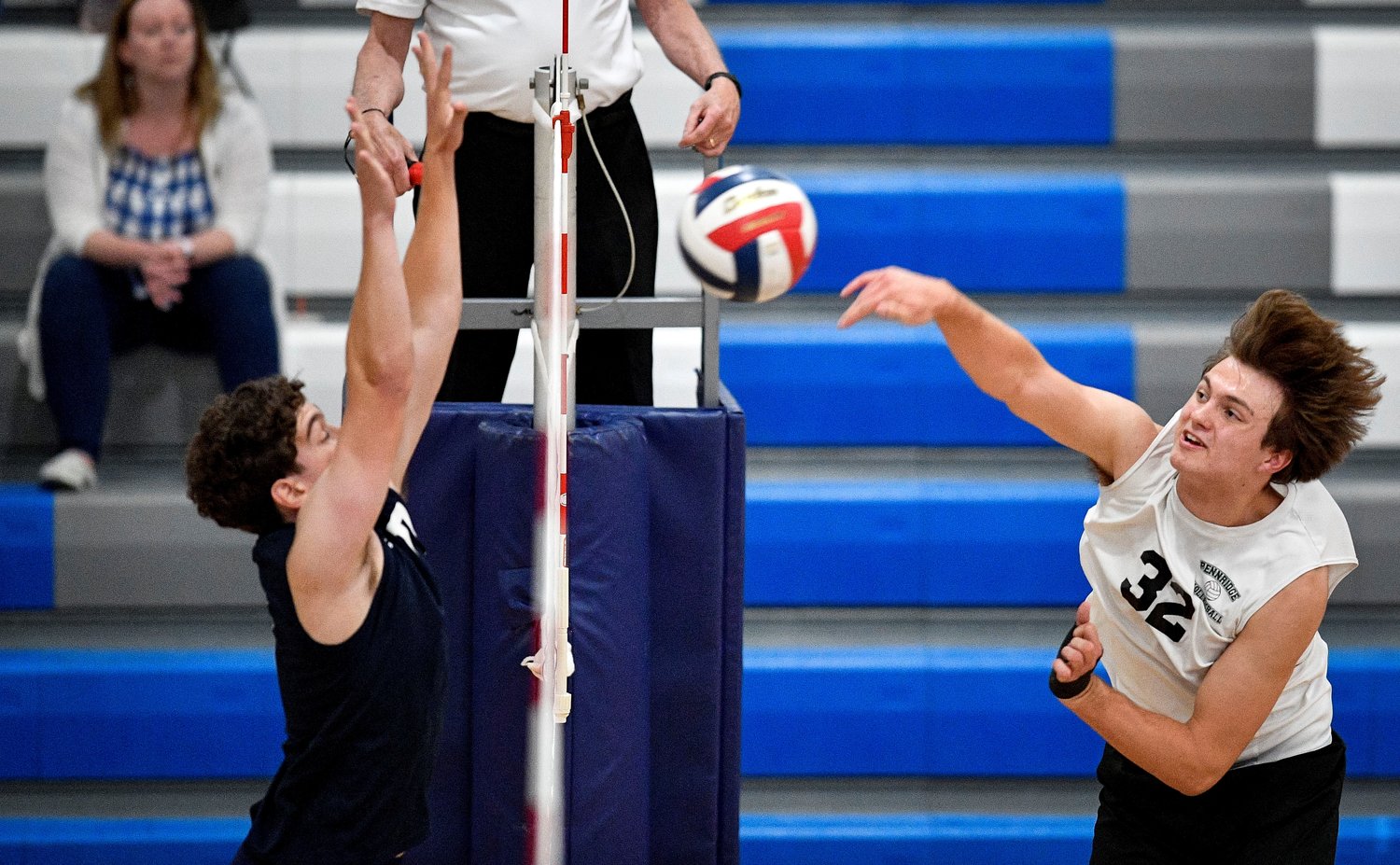 Pennridge’s Bryce Ammon slams a point past the arms of CR North’s Hunter Klein.