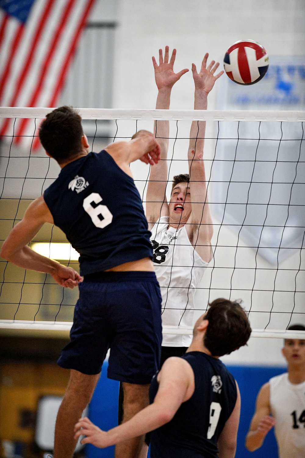Council Rock North’s Anthony DePalo slams a point past Pennridge’s Nick Smith.
